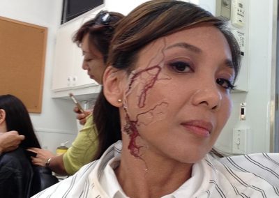 Getting FX makeup done on the set of “Matador”