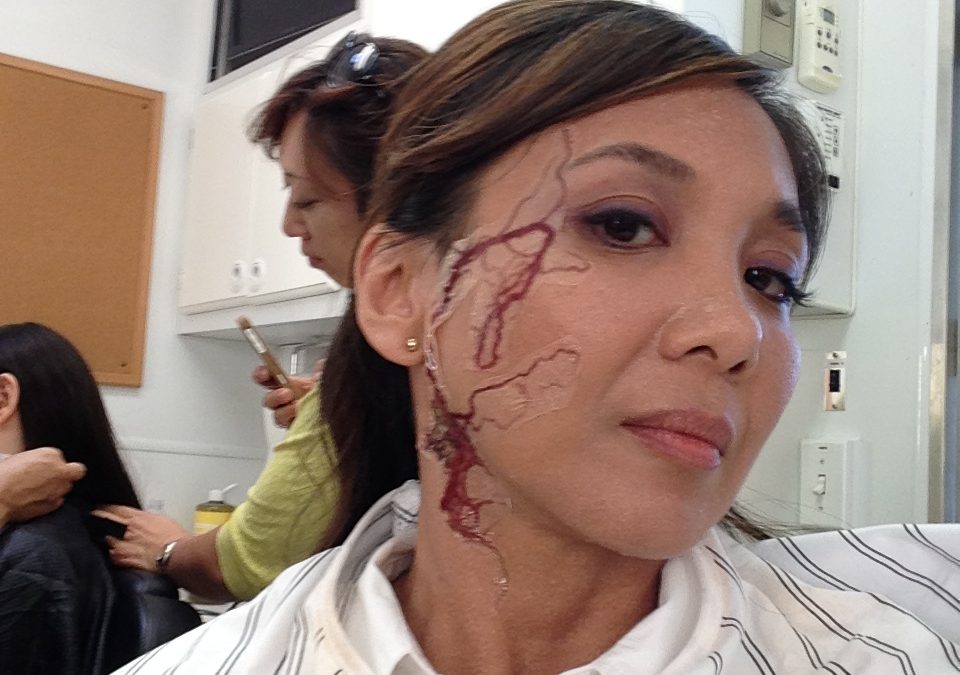 Getting FX makeup done on the set of “Matador”